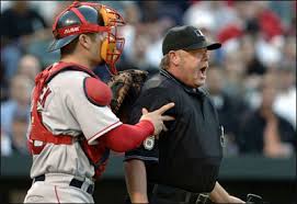 holds back Jim Joyce as