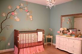 this gray and pink nursery was done on a small budget with lots of ...