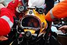 Helmet mounted torch on the left of the picture and video camera on the - via Daymix