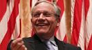 Woodward jabs Cain on China