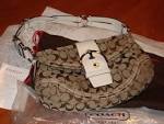 http://upload.wikimedia.org/wikipedia/commons/3/3b/Coach_purse.jpg