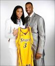 http://www.playerwives.com/wp-content/uploads/2009/05/parkerwilliamsportrait_627-tashhunc.jpg