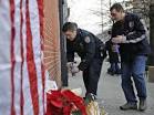 NYC mourns officers as rift widens between union, mayor