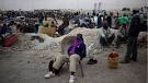 Italy finds 25 dead migrants below decks of boat from Libya | CTV News