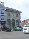 An Estate Agent's office overlooking the market square. - via Daymix