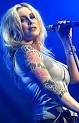 http://4.bp.blogspot.com/_lxfBQu2-6ks/TCO1Kce92II/AAAAAAAAArk/MLoXOEz4E3g/s1600/20091028120300_anouk_live2.jpg