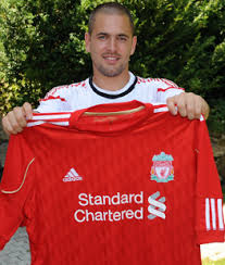 Joe Cole posing with Liverpool strip