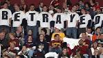 Image: Cleveland Cavaliers fans in Ohio wear shirts expressing ...