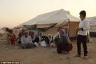 ISIS militants kill 300 MORE Yazidi men and kidnap their families.