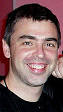 http://upload.wikimedia.org/wikipedia/commons/thumb/d/db/Larry_Page_laughs.jpg/150px-Larry_Page_laughs.jpg