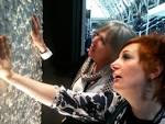 Fiona flame with Karen from Reed Harris Tiles admiring some Dreamwall at