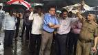 LIVE: Mumbai hit by torrential rains, train services on main line.