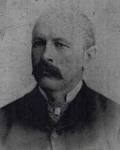 William M. Scudder, former
