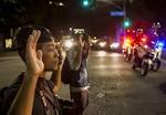 Calm in FERGUSON While Police Arrest 130-Plus in L.A. and Oakland.