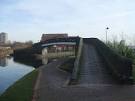 This cast iron canal bridge is over the closed arm of the Bentley Canal. - via Daymix