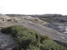 This view shows old waste, an old quarry face and, in the foreground, - via Daymix
