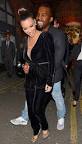 PICTURE: Kim Kardashian, Kanye West Get Touchy-Feely on Dinner