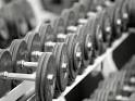 Free Weights in Rack Photographic Print by Bob Winsett at Art.