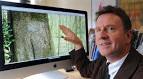 University of Otago archaeologist Dr Ian Barber examines a figurative image ... - university_of_otago_archaeologist_dr_ian_barber_ex_4d9ef636e4