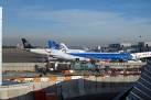 Airplanes at Terminal 1, - via Daymix