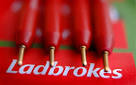 LADBROKES fires digital director Richard Ames over botched.
