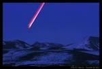 APOD: 2011 December 16 - Red Moon Rising