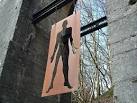 "Iron Man" hanging from an old bridge support from the long-closed Mid-Wales - via Daymix