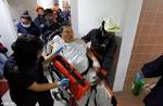 120kg woman stuck under bench after falling through gap, AsiaOne.