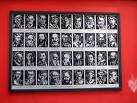 On the wall are these mugshots - via Daymix