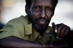 16. A Somali policeman holds