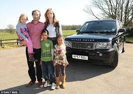 Karen Hughes with partner Adam Maddison and their children. She will be £300 better off thanks to the Chancellor\u0026#39;s decision to scrap petrol hikes in January - article-0-0B41C06E00000578-781_634x452