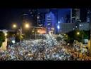 Hong Kong democracy groups take to streets as key vote looms.