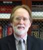 Dr Charles Williams.
