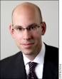 Adam J. Falk