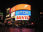 Neon Glow: Piccadilly Circus - via Daymix