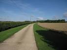 Track from Yen Hall Farm. Concrete track, also a public footpath. - via Daymix