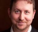 Ian Jensen's act is energetic,