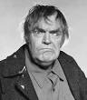 Crazy Jack Elam looks on in