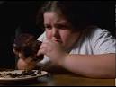 Fat ass eats a chocolate cake