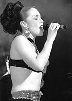 Veronica Vazquez belts out a song during a perfomance. \u0026#39;It is amazing, the treatment I get just from playing Selena,\u0026#39; Vazquez said. - 17selena2