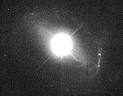 APOD: August 24, 1996 - Why is QSO 1229+204 so Bright?