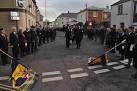 As the national anthem is played the flags are lowered and the police salute - via Daymix