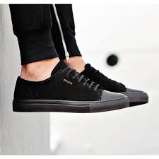 Axel Arigato all black sneaker with a classic design, handcrafted ...