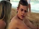 Shirtless Beach Scene
