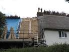 ST8609 : Thatching in progress - via Daymix