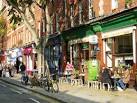 The shop on the immediate right specialises in vegetarian and vegan food. - via Daymix