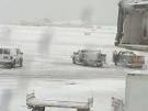 Planes skids off runway at LaGuardia airport, crashes into fence.