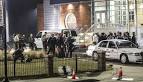 Police swarm home in St Louis suburb after ambush of two.
