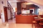 Simple Living Room Design With Black Spiral Stairs Glossy Black ...