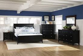 Couples Bedroom Design Concept featuring Black Wooden Bed Frames ...